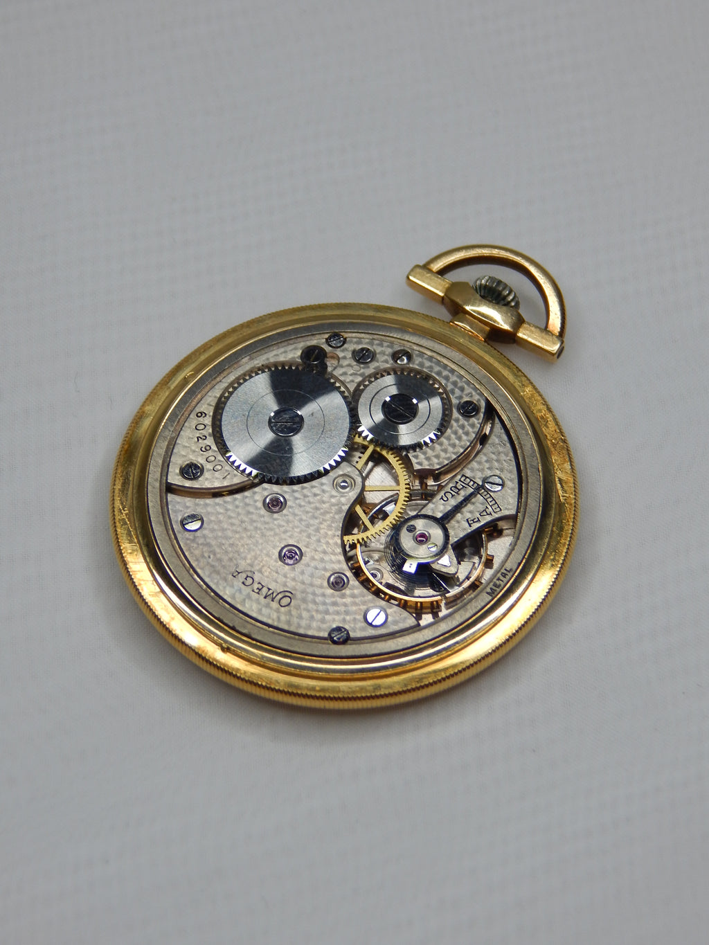 Zlaté vreckové hodinky Omega 1920