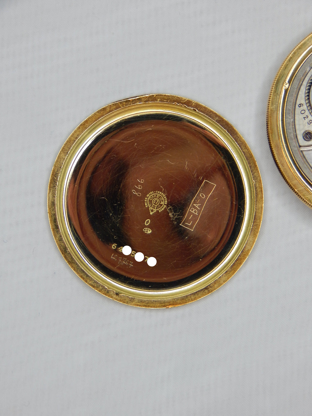 Zlaté vreckové hodinky Omega 1920