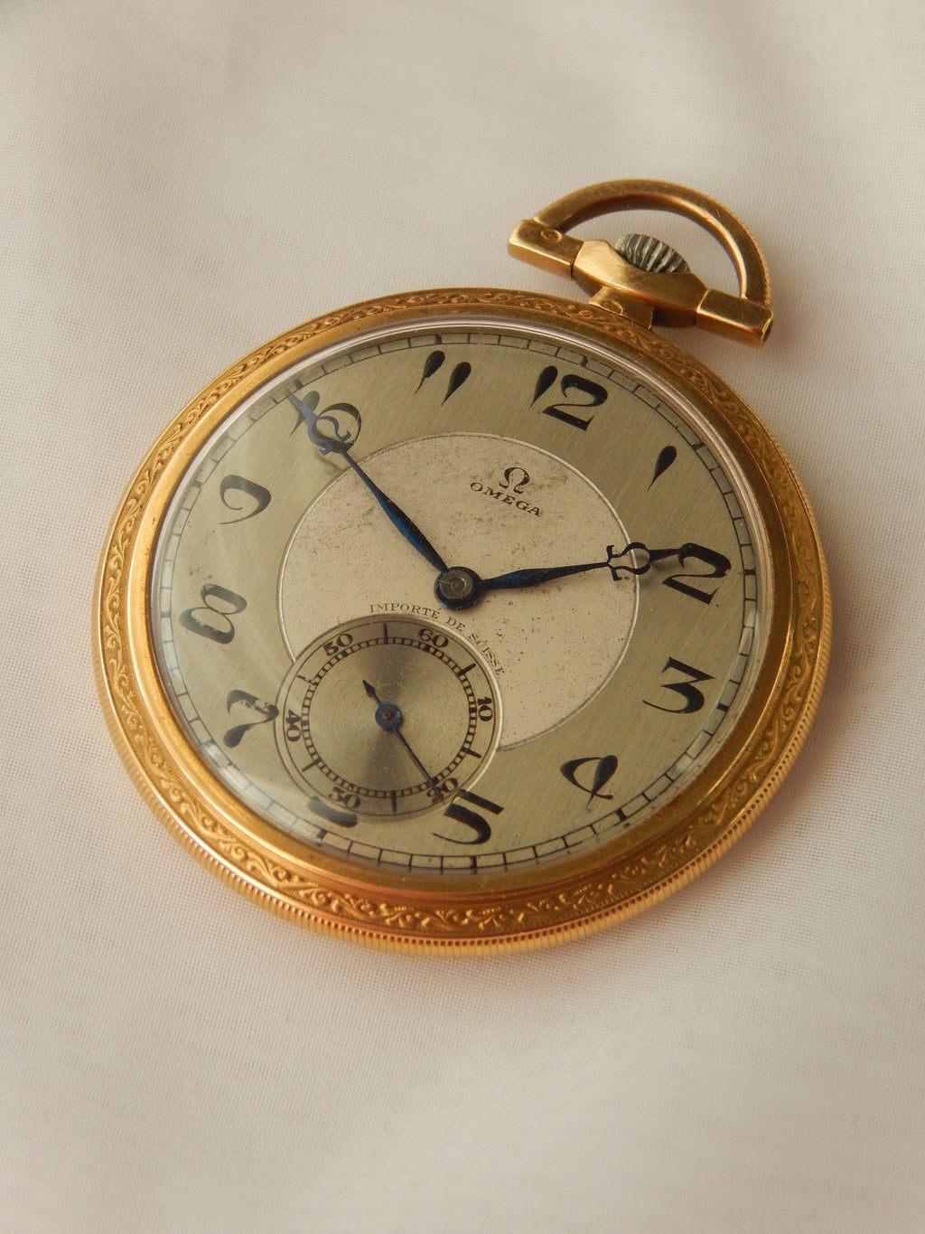Zlaté vreckové hodinky Omega 1920